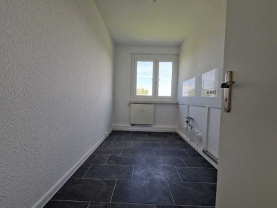 Familienfreundliche 4-Zimmer-Wohnung mit Balkon und lichtdurchfluteter Küche!