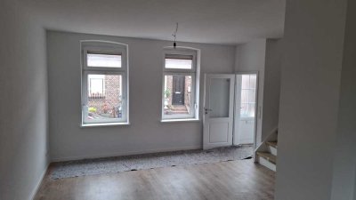Werfthaushälfte in Wilhelmshaven mit Garten