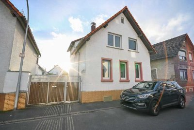 DIETZ: Freistehendes Einfamilienhaus mit DO-Garage inmitten von Pfungstadt!