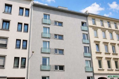 Gemütliche Dachgeschosswohnung mit Balkon und Lift im Zentrum-Süd