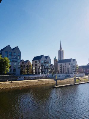 Direkt an der Weser: Top-Wohnung mit toller Ausstattung und großzügiger Terrasse mit Garten