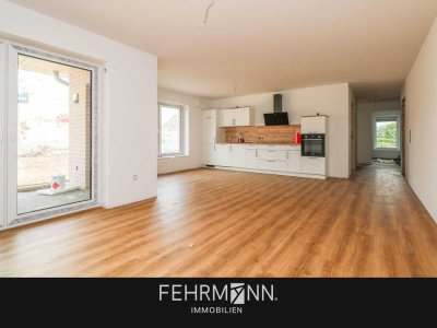 Erstklassige Erdgeschosswohnung mit idyllischer Terrasse und stilvollem Wohnkonzept