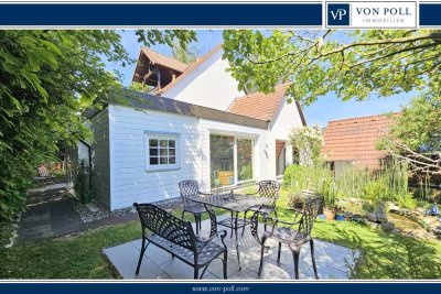 Wohnjuwel mit besonderer Ausstattung, viel Charme, idyllischem Garten, Indoor-Pool und Garage