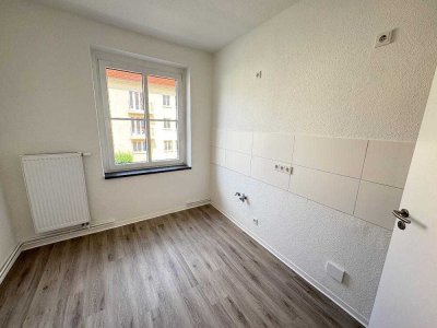 Begrüntes, ruhiges Stadtgebiet unweit vom Zentrum! 3 Zimmer Wohnung mit Dusche und Balkon!