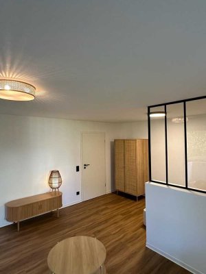 Nach Sanierung: Moderne teilmöblierte 1,5-Zimmer-Wohnung mit EBK und Terrasse