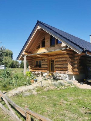 Naturstammhaus von Charlie Manz, das Premium Holzhaus