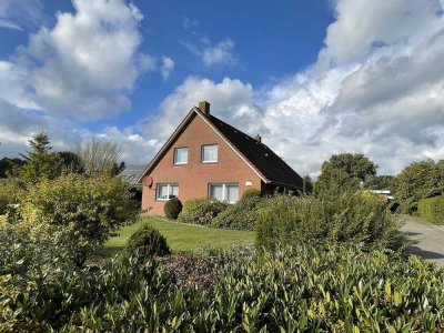 VERKAUFT - Top gepflegtes, ebenerdiges Einfamilienhaus mit Garage in Siedlungslage von Holtland