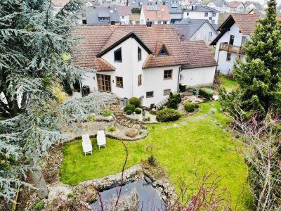 Einfamilienwohnhausparadies: Freistehendes Wohnhaus mit Doppelgarage, moderner Küche und Top-Garten!