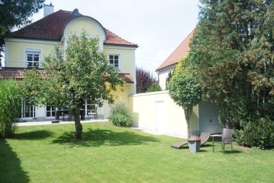Kernsanierte Stadtvilla mit wunderschönen Garten in bester Wohnlage