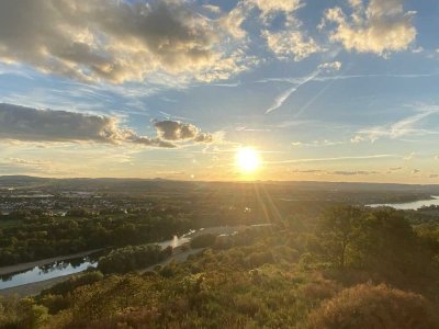 Wohnen mit traumhaften Panoramablick auf das Rheintal und eigenem Garten