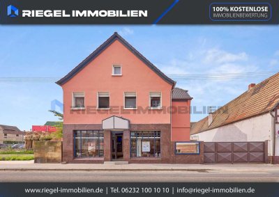 Sie hier? Wir auch! Repräsentatives Wohn- und Geschäftshaus mit Ladeneinheit und zwei Wohnungen