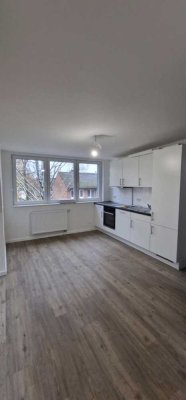 Erstbezug nach Sanierung. Top ausgestattete DG-Wohnung in typisch norddeutschem Rotklinker.