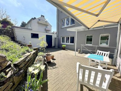 **HOCHwertig ausgestattete EG-Wohnung mit Terrasse/Garten und breiter Tandemgarage in Odenkirchen**