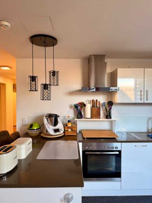 Mitten im Geschehen - moderne Penthouse-Wohnung mit Stadtblick