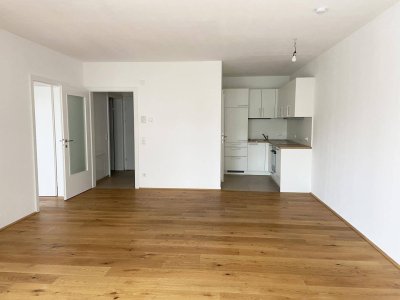 Helle Gartenwohnung inkl. Einbauküche, Loggia und Terrasse - Top B02
