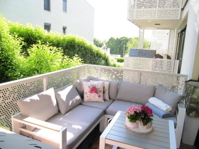 Zauberhafte 60 m² Terrassenwohnung mit kleinem Garten - Baujahr 2021 - inkl. Tiefgaragenplatz
