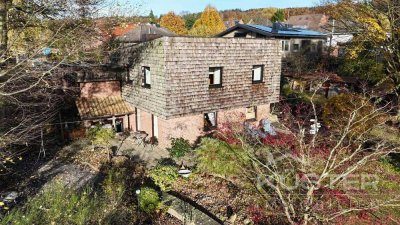 KÜSTER IMMOBILIEN präsentiert: Außergewöhnliches Architektenhaus mit traumhaftem Garten