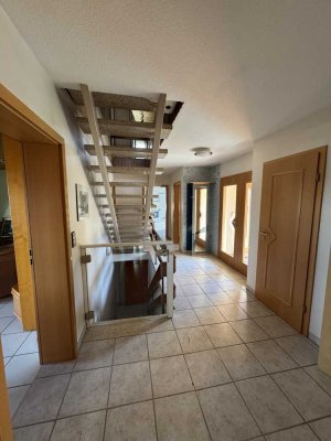 Einfamilienhaus mit Baugrundstück und traumhaftem Panoramablick – Ihr neues Zuhause wartet!