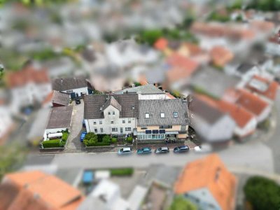 Top-Invest in Erlensee: Vielseitig nutzbare Liegenschaft mit Wohnen und Gewerbe
