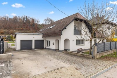 Raumwunder in Laakirchen: Großzügiges Wohnhaus mit Garten, Doppelgarage &amp; vielseitigen Nutzungsmöglichkeiten