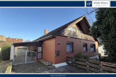 Wollmesheimer Höhe - Ruhig gelegenes Einfamilienhaus mit Klinkerfassade, kleinem Garten und Garage
