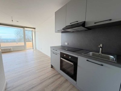 Erstbezug! Top EG-Appartement mit Häcker-EBK, modernem Bad & sonniger Loggia