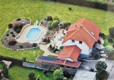 Großzügiges EFH in Top-Lage: Gartenparadies mit Pool  Sauna