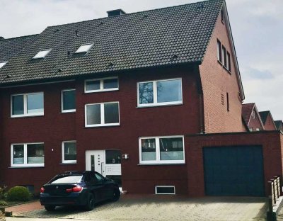 Helle Erdgeschosswohnung mit sonnigem Garten und eigener Garage