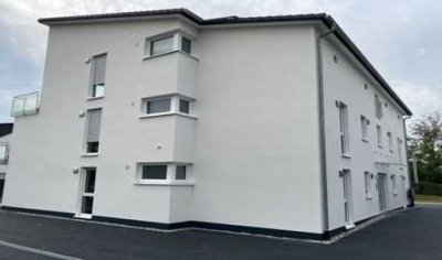 Grünes Wohnen in Linkenheim: Neuwertige energieeffiziente 3-Zimmer-Wohnung mit Garten