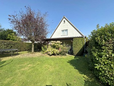 Charmante Doppelhaushälfte mit modernem Flair und idyllischem Garten in Meerbusch-Osterath