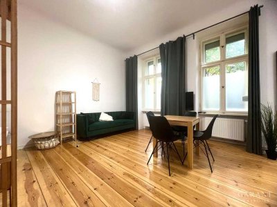 Moderne 1 Zimmer-Wohnung mit Altbaucharme und ca. 17 qm Gartenanteil!