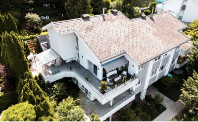 Wohntraum der Extraklasse: Exklusives Penthouse auf 2 Etagen mit großer Terrasse und schönem Garten in begehrter Lage