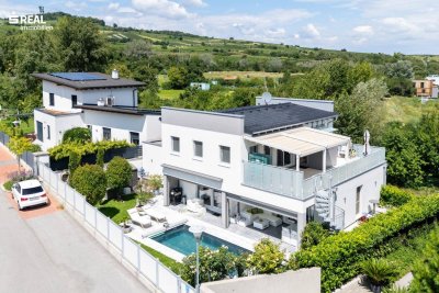 Luxusimmobilie am Fuße der Weinberge in Guntramsdorf - Pool, Sauna, Doppelgarage und wunderschön angelegtem Garten - alles hochwertig!