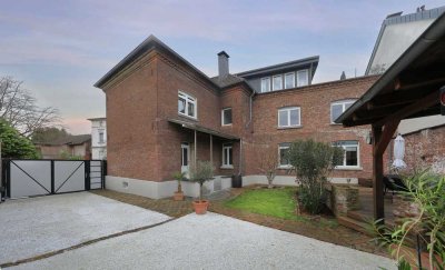 Stilvolle Altbau-Maisonettewohnung mit charmantem eigenen Garten