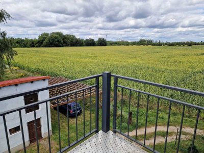 ***Sonnige Dachgeschosswohnung über den Dächern von Waßmannsdorf sucht nette Familie***