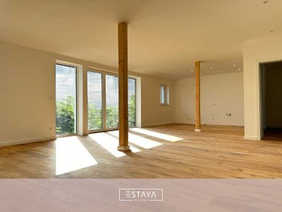 Großzügige, lichtdurchflutete Familienwohnung mit zwei Bädern und Balkon