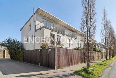 Modernes Reihenendhaus mit Dachterrasse und Südgarten