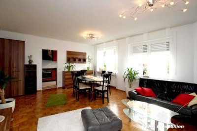 BERK Immobilien - Gepflegte 2-Zimmer-ETW mit Gartenanteil, großer Terrasse, Garage + 100m² Dachboden