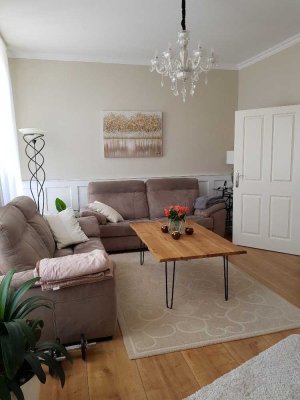 Sanierte EG-Wohnung mit vier Zimmern sowie Terrasse und Einbauküche in Bückeburg