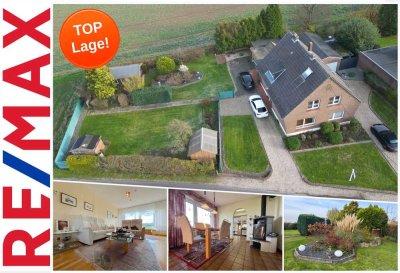 Schönes Einfamilienhaus mit Einliegerwohnung und großem Grundstück direkt am Rhein gelegen