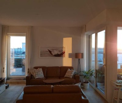 Lichtdurchflutete Wohnung mit Dachterrasse im Candis Quartier