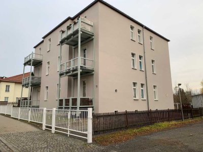 3 Zimmer-Wohnung im 1. Obergeschoss mit Balkon