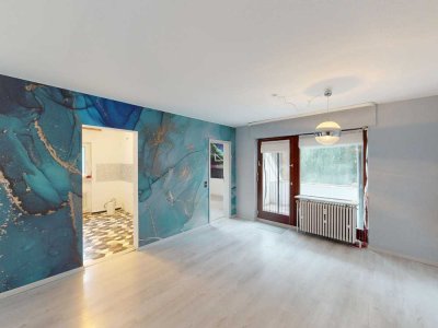 Großzügige Maisonettewohnung mit Traumfernblick – Renovierungsbedarf bietet großes Potenzial