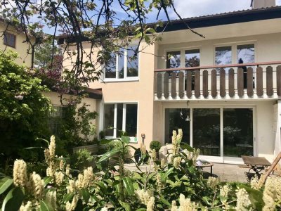 Traumwohnung wie "Doppelhaushälfte" mit offenem Kamin und Südgarten im Herzen Starnbergs