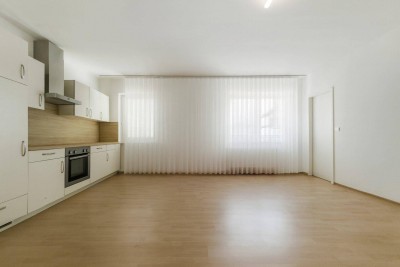 Anlegerwohnung zu verkaufen: befristet vermietete 3-Zimmer-Wohnung + Tiefgaragenplatz mit 4,4% Rendite und Wertzuwachspotential