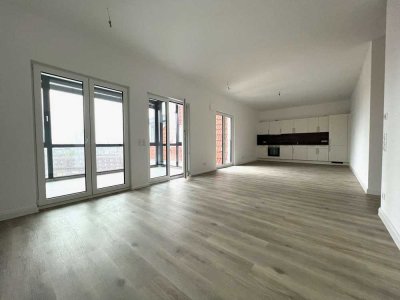 Neuwertige  - Top Etagenwohnung mit Wintergarten und Tiefgarage in zentraler Lage