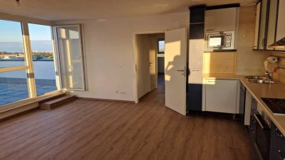 Wohnen über den Dächern: Moderne 3-Zimmer-Wohnung mit Traumdachterrasse in Unterhaching