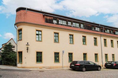 Investitionsmöglichkeit mit Charme: Langjährig vermietete, barrierefreie Wohnung in Freiberg