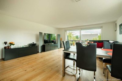 Ihre Ruheoase im Grünen – neuwertige Erdgeschosswohnung mit Terrasse und Gartenparadies