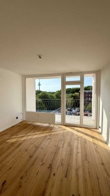 Erstbezug nach hochwertiger Sanierung - Moderne 3-Zimmer-Wohnung mit Balkon & Aufzug